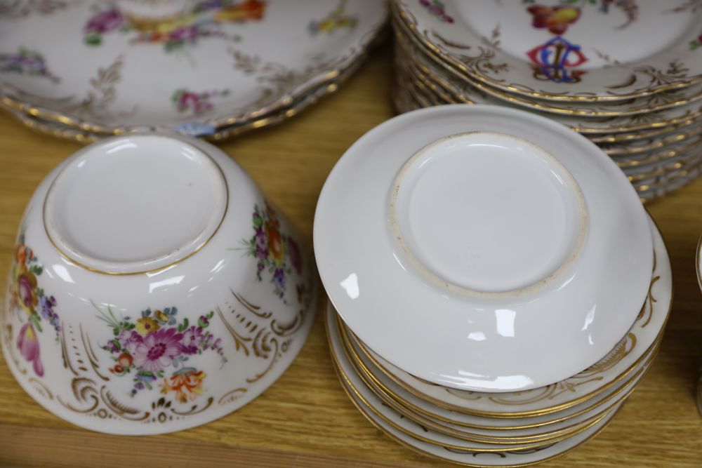 A 19th century Continental 29 piece gilt and floral coffee set, monogrammed, coffee pot 26cm